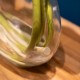 Real touch lillies looped stem vase with faux water 50cm