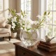 Real touch lillies crossed stem vase with faux water 50cm